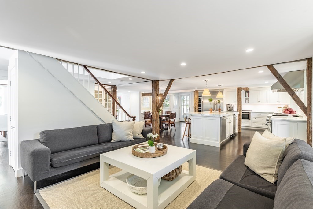 201 Lexington Road Concord, MA 01742 - Photo 12 of 41 a living room with furniture and a table