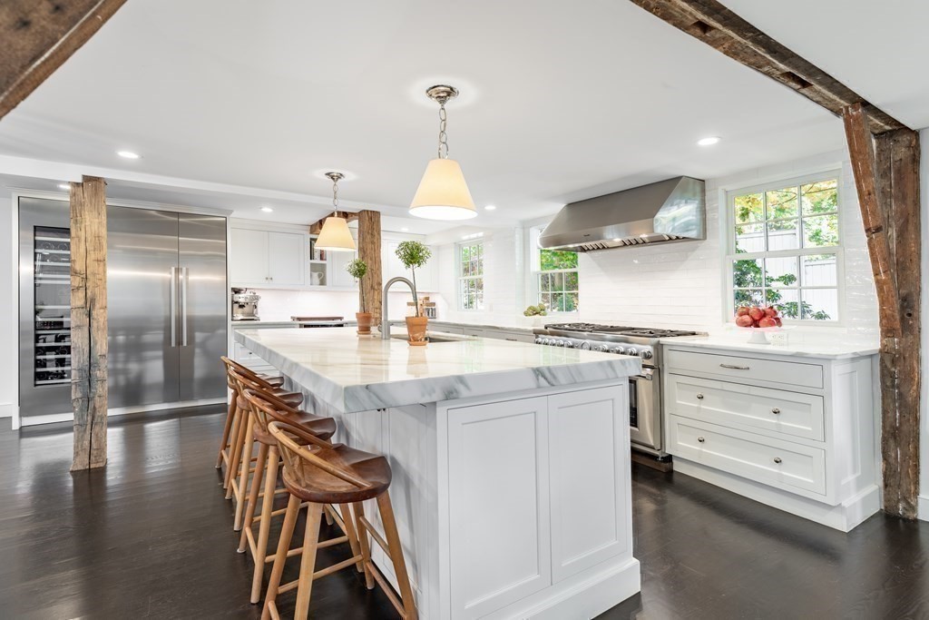 201 Lexington Road Concord, MA 01742 - Photo 14 of 41 a kitchen with a sink appliances cabinets and a counter top space