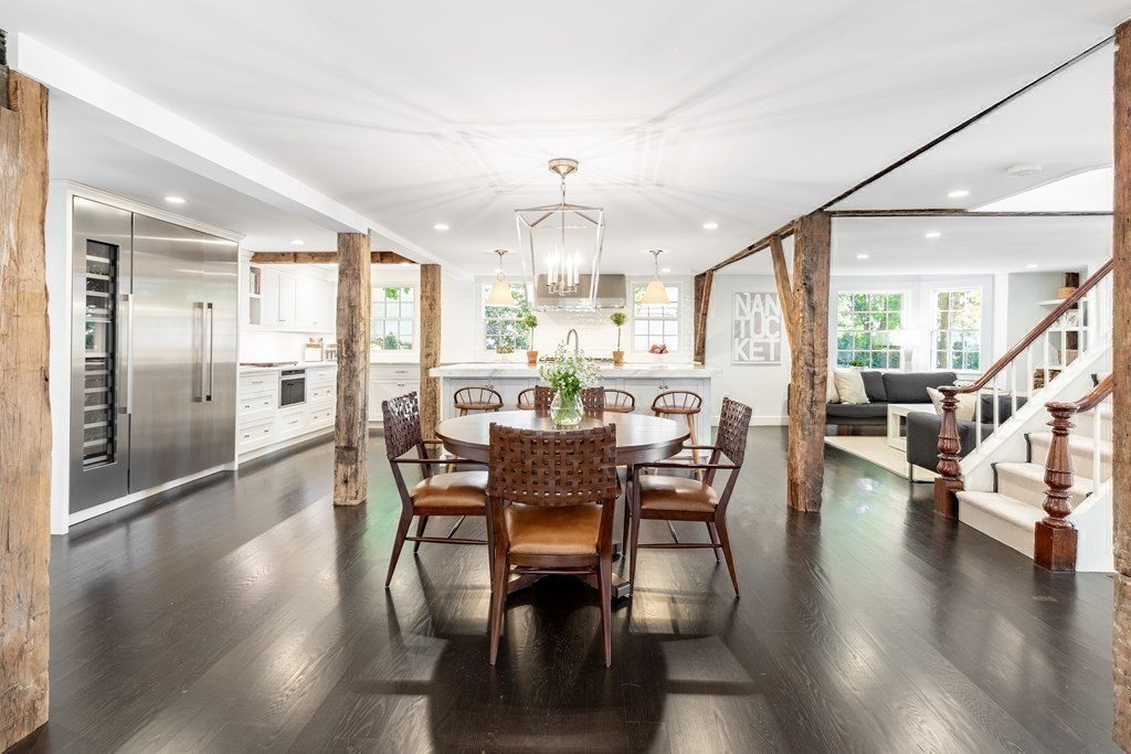 201 Lexington Road Concord, MA 01742 - Photo 16 of 41 a view of a dining room with furniture window and wooden floor