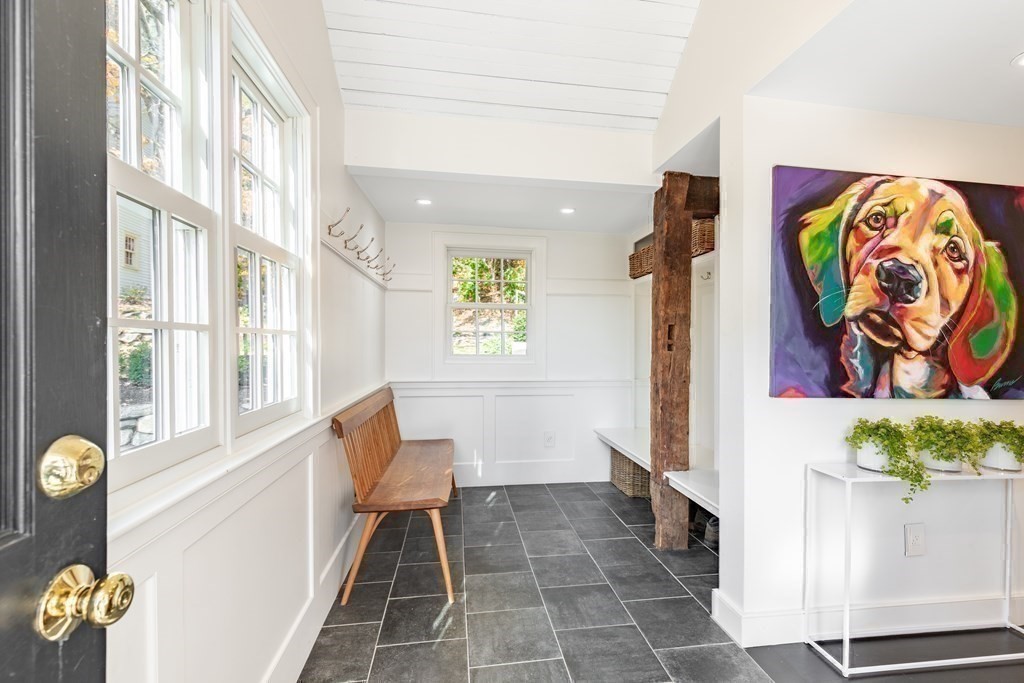 201 Lexington Road Concord, MA 01742 - Photo 19 of 41 a view of an entryway with wooden floor