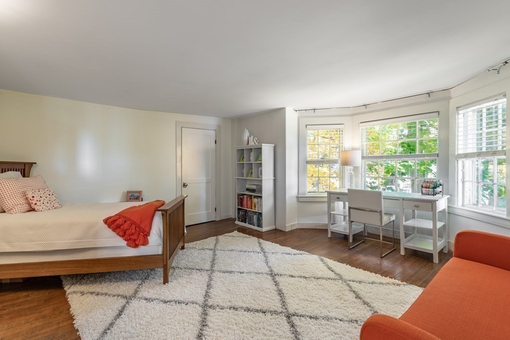 201 Lexington Road Concord, MA 01742 - Photo 28 of 41 a living room with furniture and a window