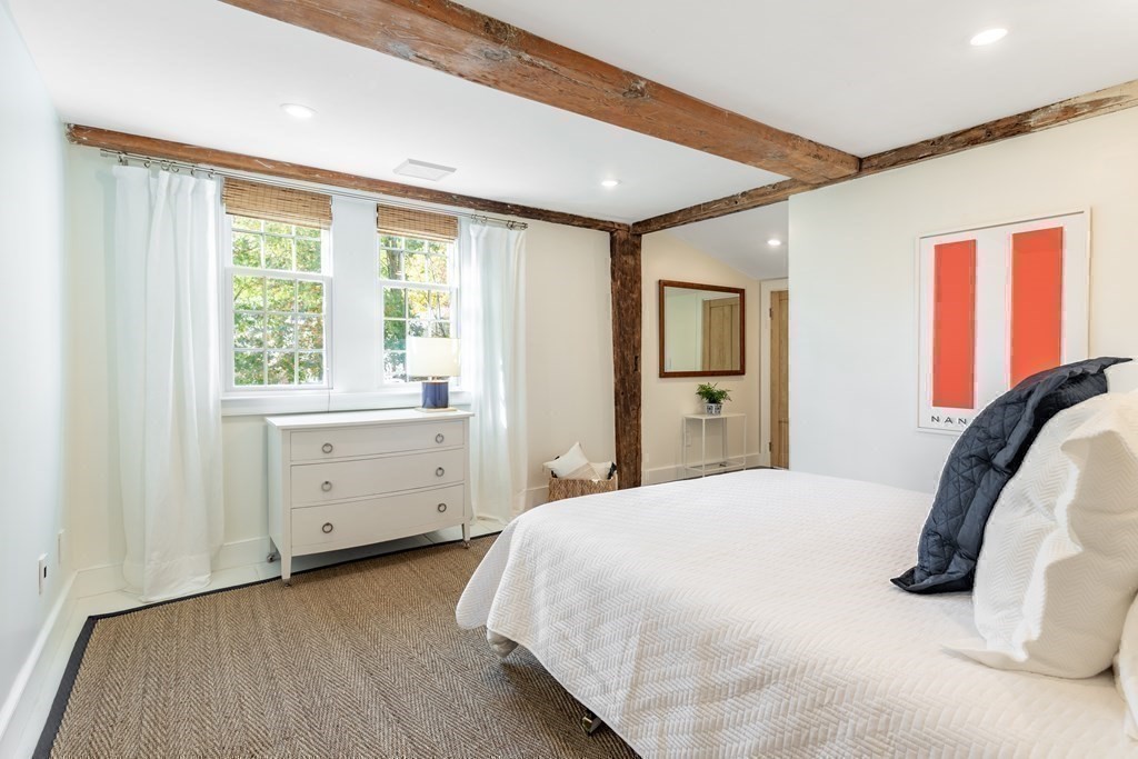 201 Lexington Road Concord, MA 01742 - Photo 30 of 41 a bedroom with a bed and a window