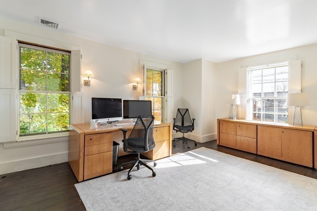 201 Lexington Road Concord, MA 01742 - Photo 32 of 41 a view of workspace with wooden floor and windows
