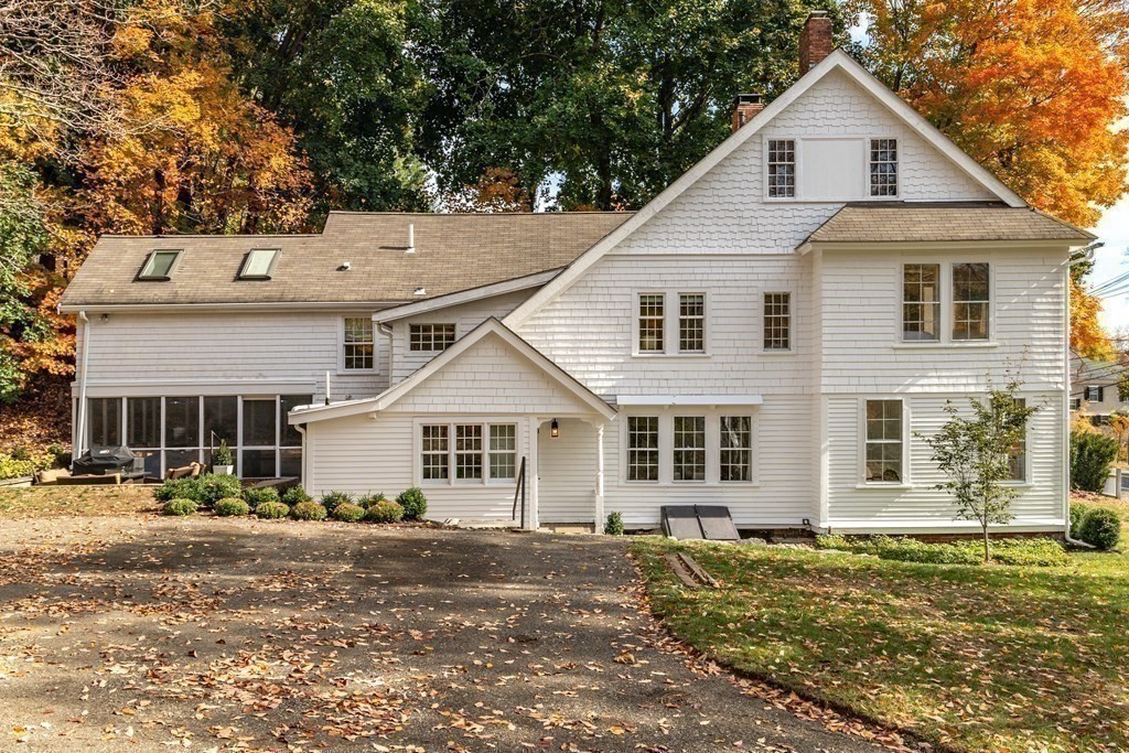 201 Lexington Road Concord, MA 01742 - Photo 4 of 41 a view of a yard in front of a house