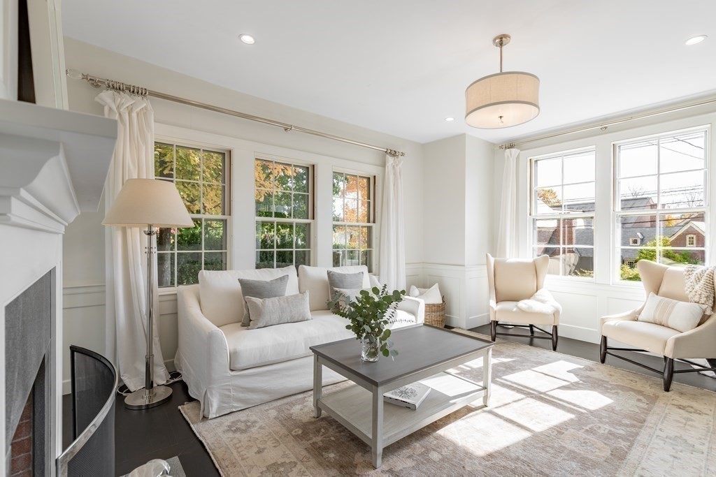 201 Lexington Road Concord, MA 01742 - Photo 8 of 41 a living room with furniture and a large window