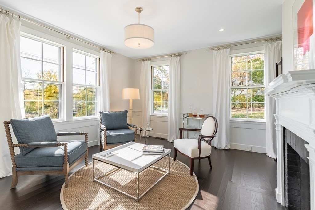 201 Lexington Road Concord, MA 01742 - Photo 9 of 41 a living room with furniture fireplace and window