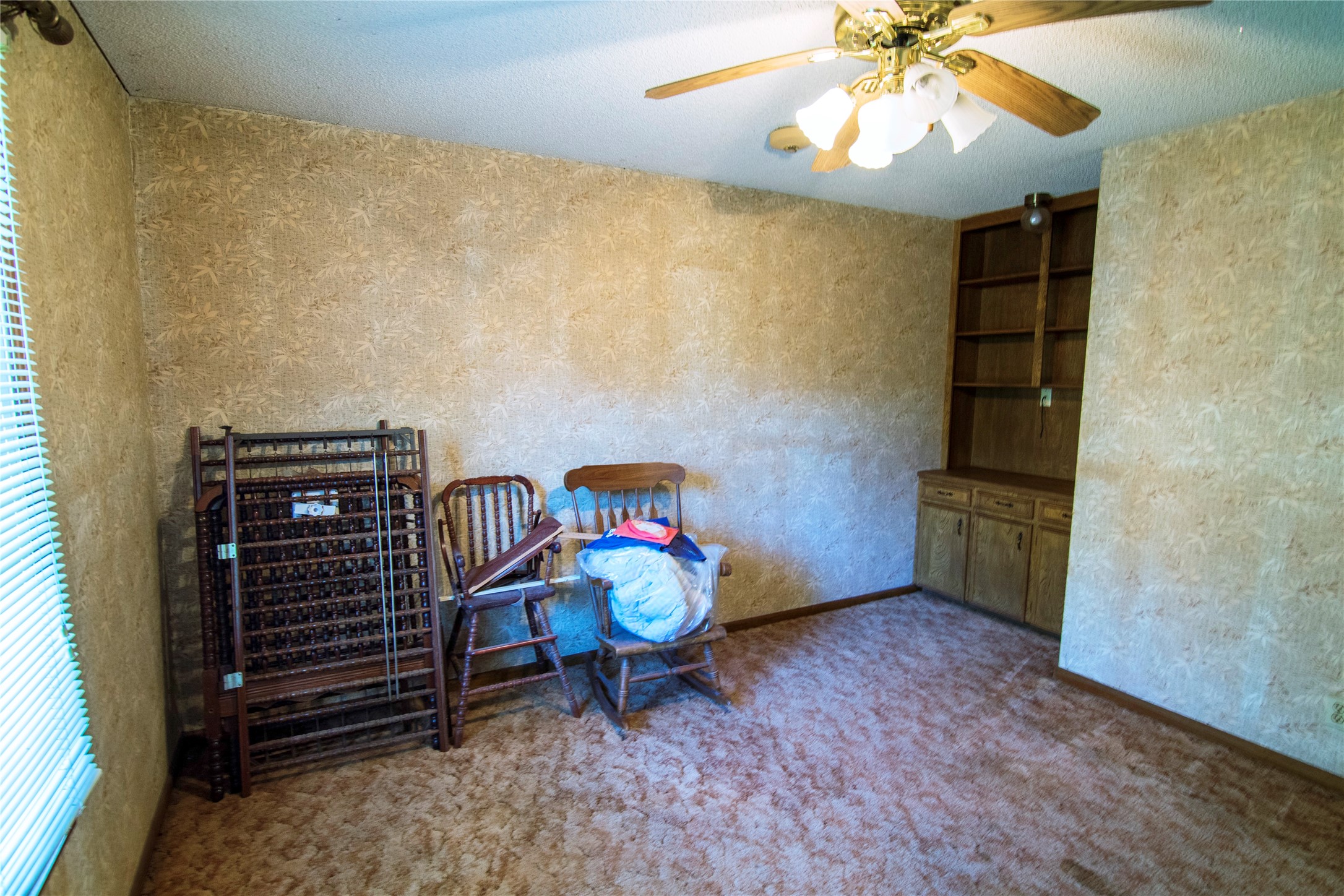 209 Simpson Street Schulenburg, TX 78956 - Photo 12 of 15 a view of an empty room and window