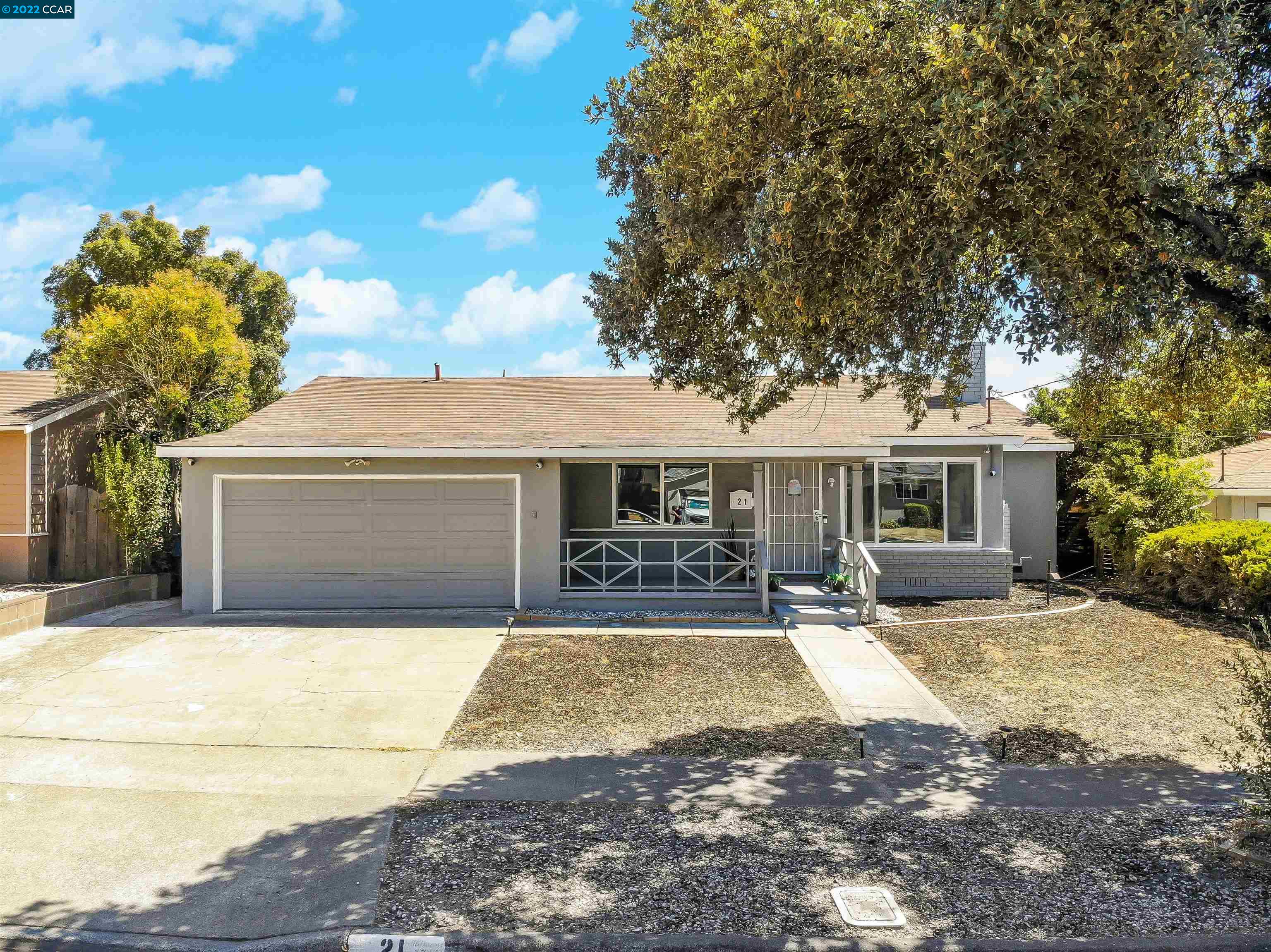 21 Clearbrook Road Antioch, CA 94509 - Photo 1 of 1 a front view of a house with a yard and garage