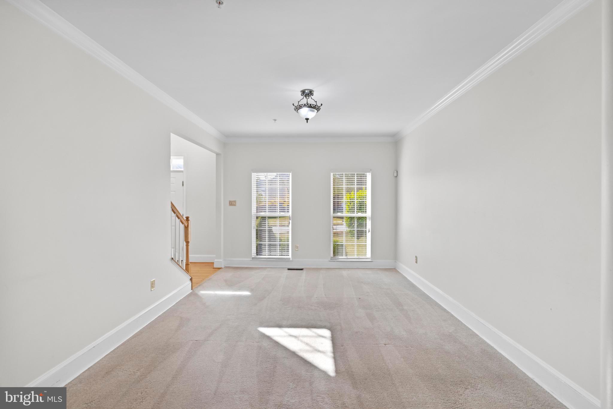 8008 Dorado Terrace Brandywine, MD 20613 - Photo 11 of 55 an empty room with windows