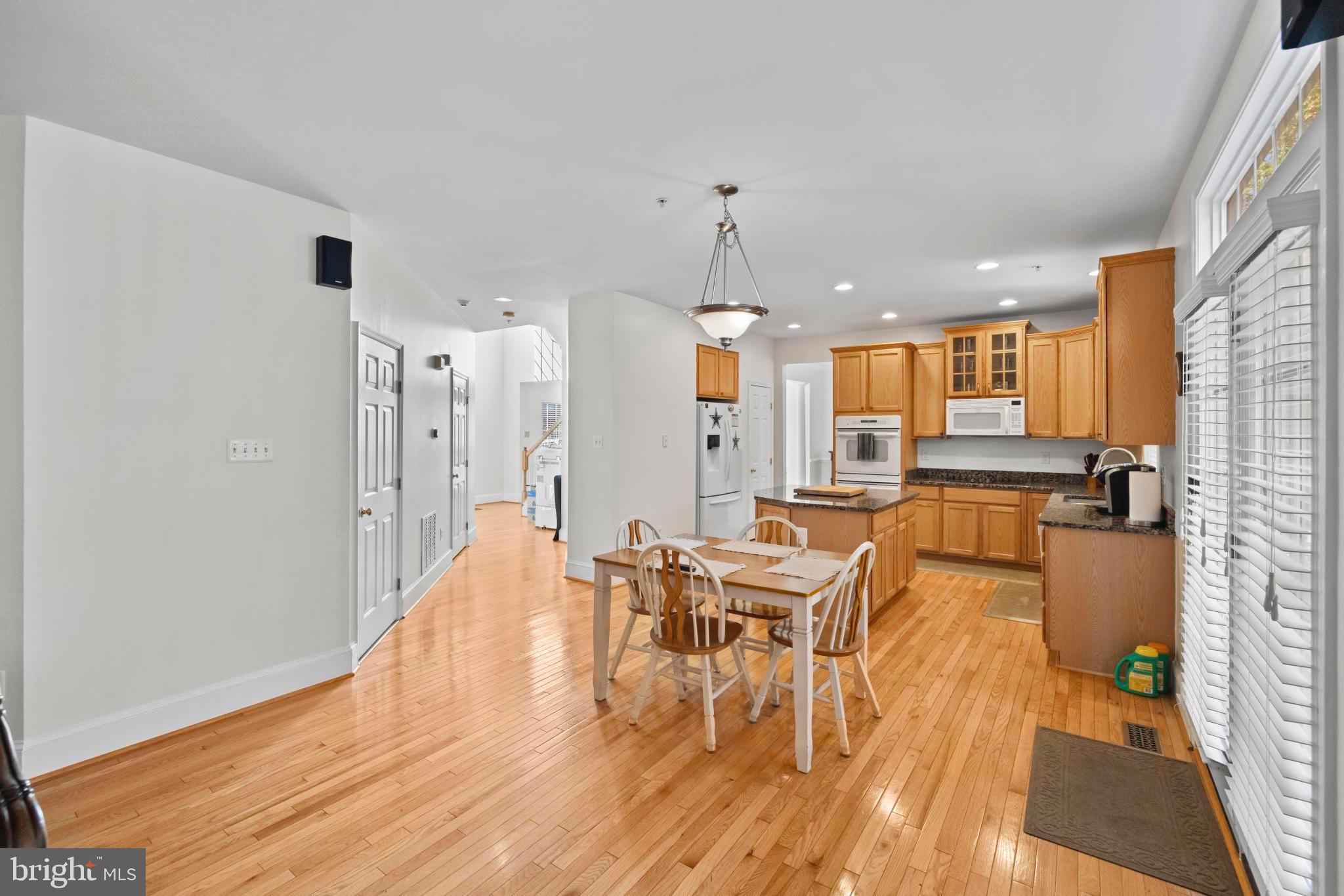 8008 Dorado Terrace Brandywine, MD 20613 - Photo 18 of 55 a living room with furniture and kitchen view