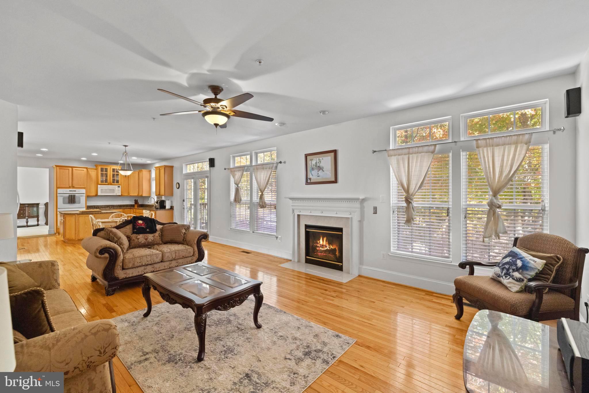 8008 Dorado Terrace Brandywine, MD 20613 - Photo 20 of 55 a living room with furniture fireplace and a table