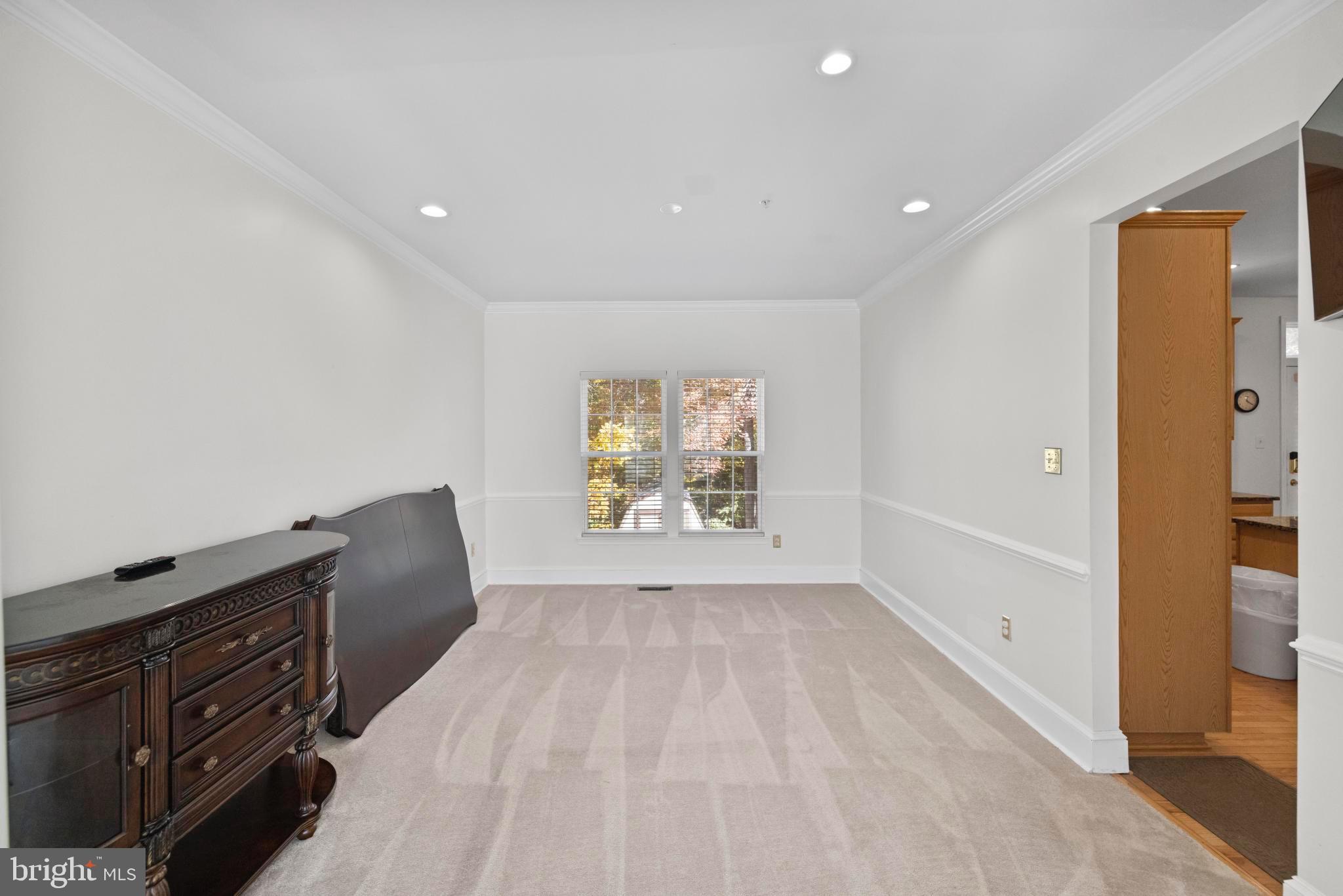 8008 Dorado Terrace Brandywine, MD 20613 - Photo 10 of 55 wooden floor in an empty room with a window