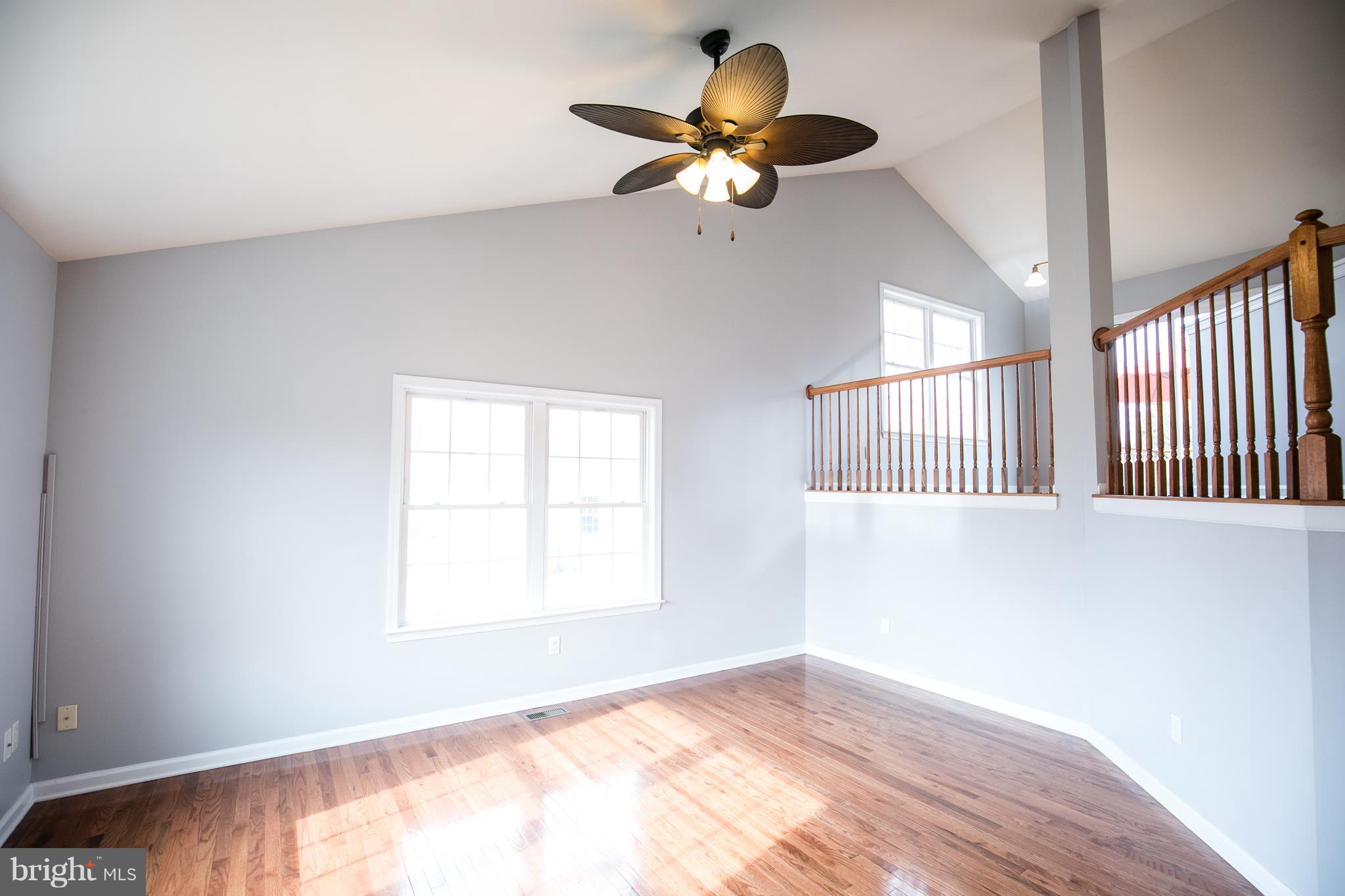 334 Virginia Road Stevensville, MD 21666 - Photo 10 of 40 Living room open to kitchen above