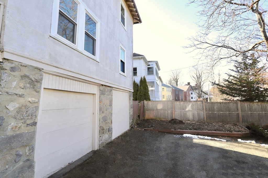 42 Radnor Road Boston, MA 02135 - Photo 16 of 17 front view of a house with a street