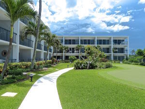 150 North Ocean Boulevard, Unit S26 Delray Beach, FL 33483 - Photo 3 of 8 front view of a house with a yard