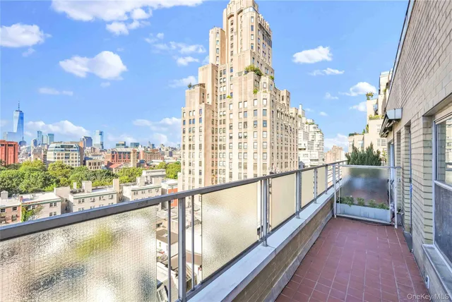 a view of city with tall buildings