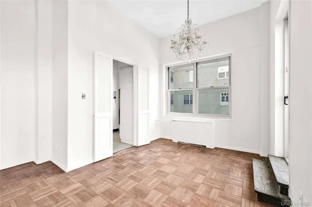a kitchen with a stove and a refrigerator