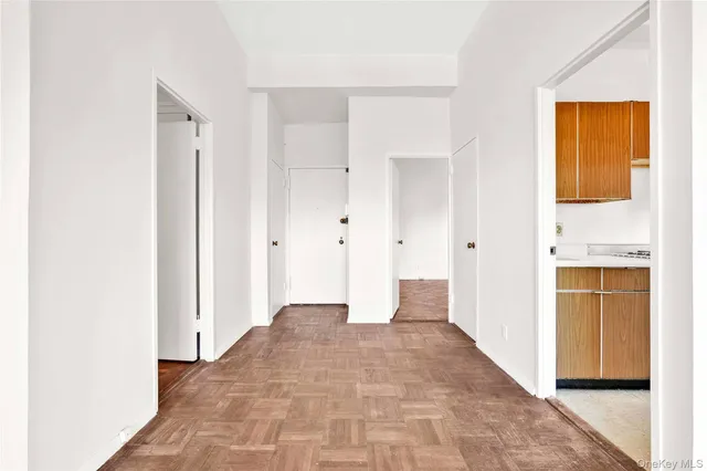 a kitchen with a stove and a refrigerator