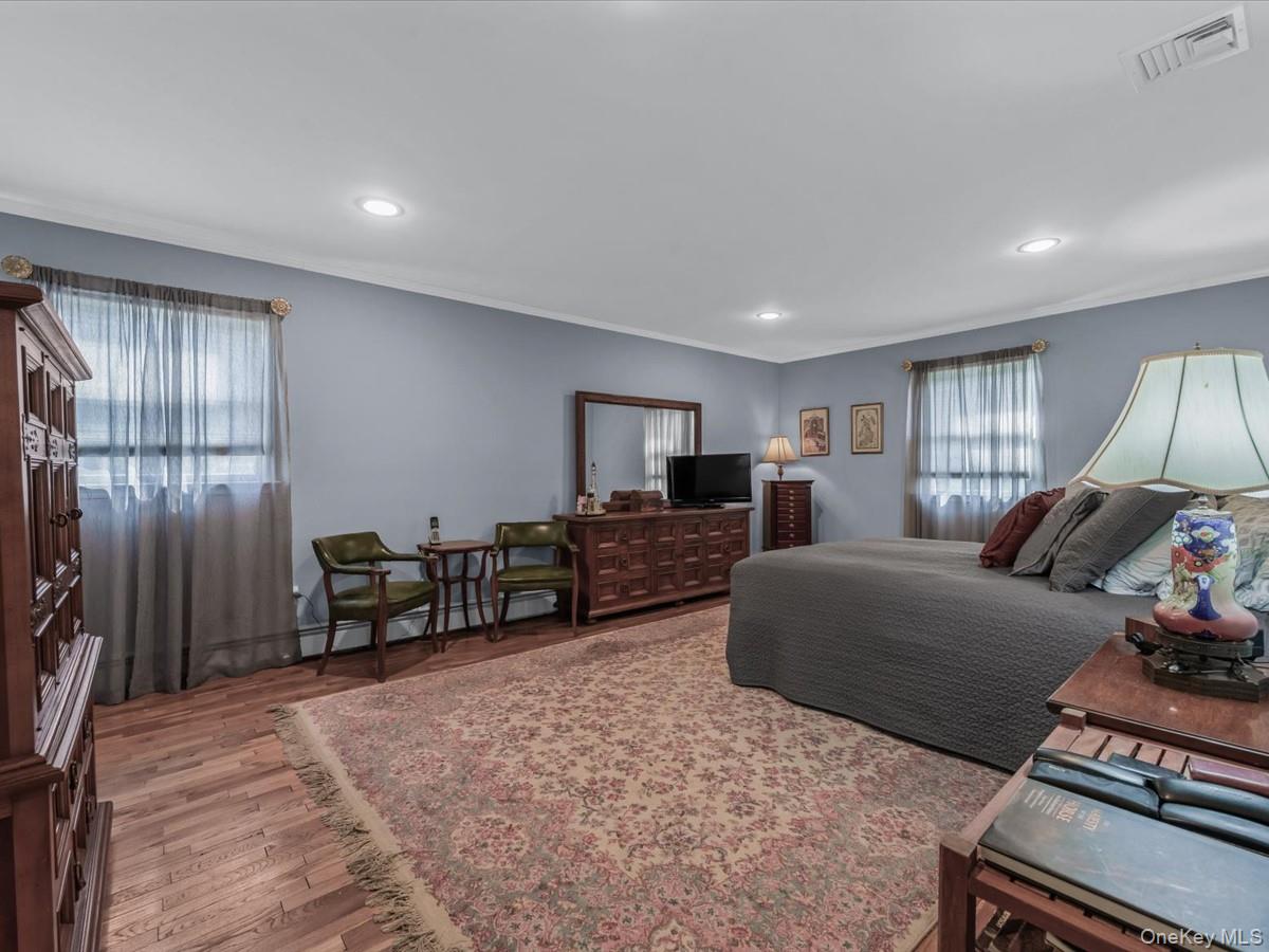 29 Sun Hill Road Nesconset, NY 11767 - Photo 17 of 32 a bed room with furniture and a window