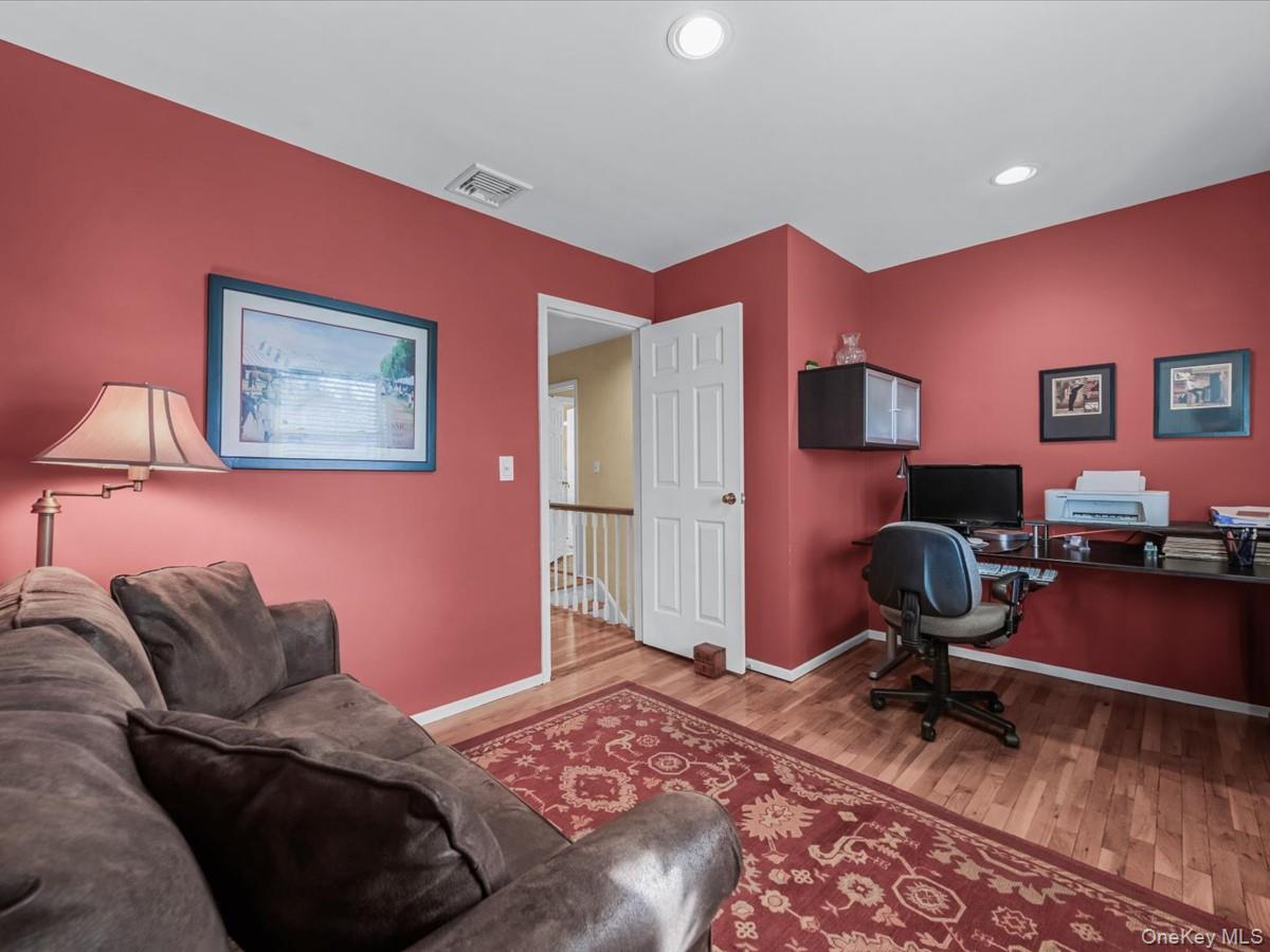 29 Sun Hill Road Nesconset, NY 11767 - Photo 21 of 32 a bedroom with furniture and a rug