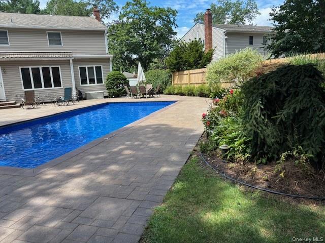 29 Sun Hill Road Nesconset, NY 11767 - Photo 30 of 32 a view of a house with a yard