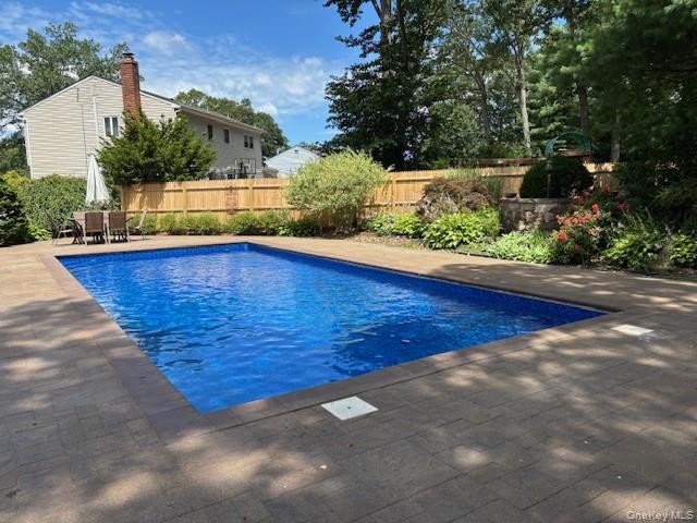29 Sun Hill Road Nesconset, NY 11767 - Photo 31 of 32 a view of a swimming pool with an outdoor space