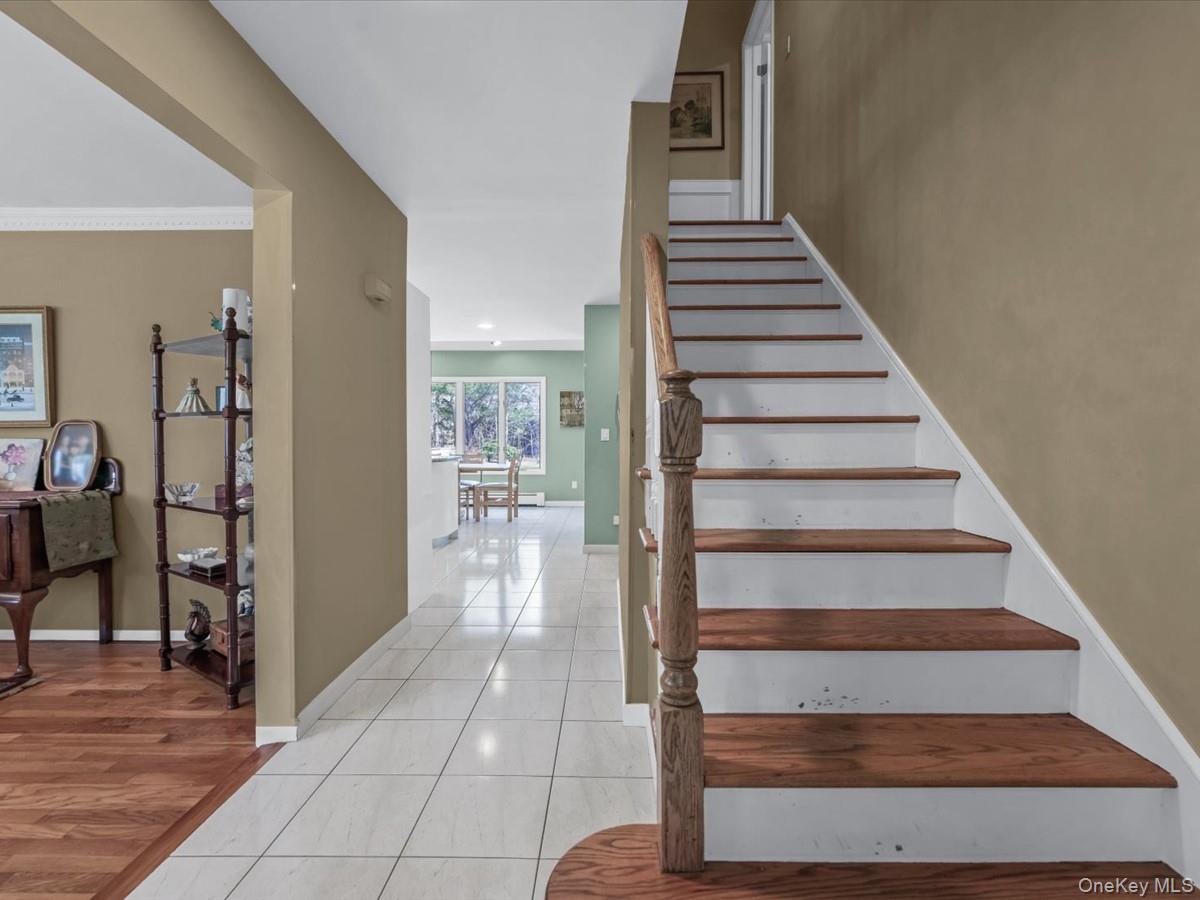 29 Sun Hill Road Nesconset, NY 11767 - Photo 6 of 32 a view of entryway and hall with wooden floor