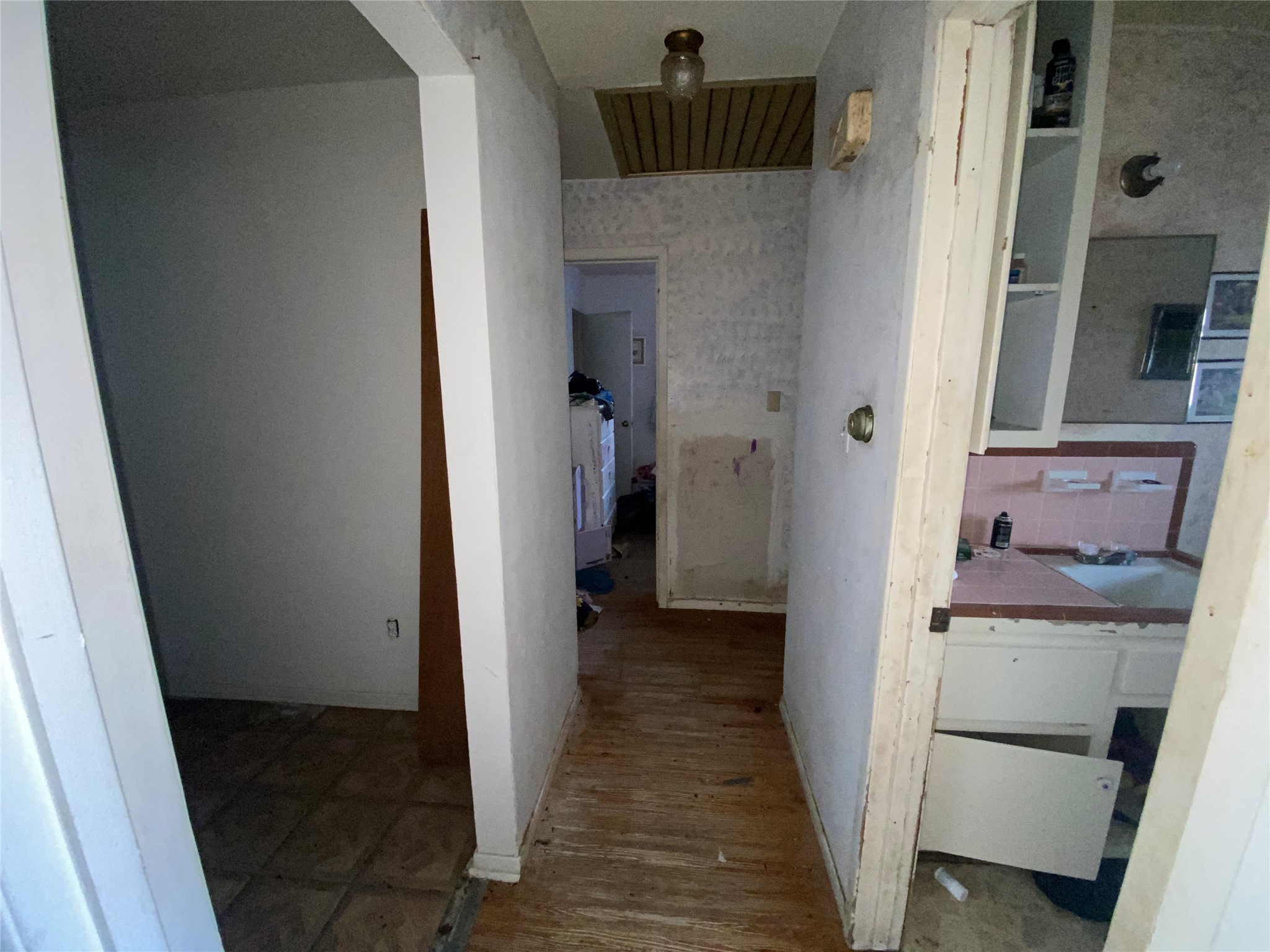 14947 Colville Street Channelview, TX 77530 - Photo 3 of 6 a view of a bathroom from a hallway