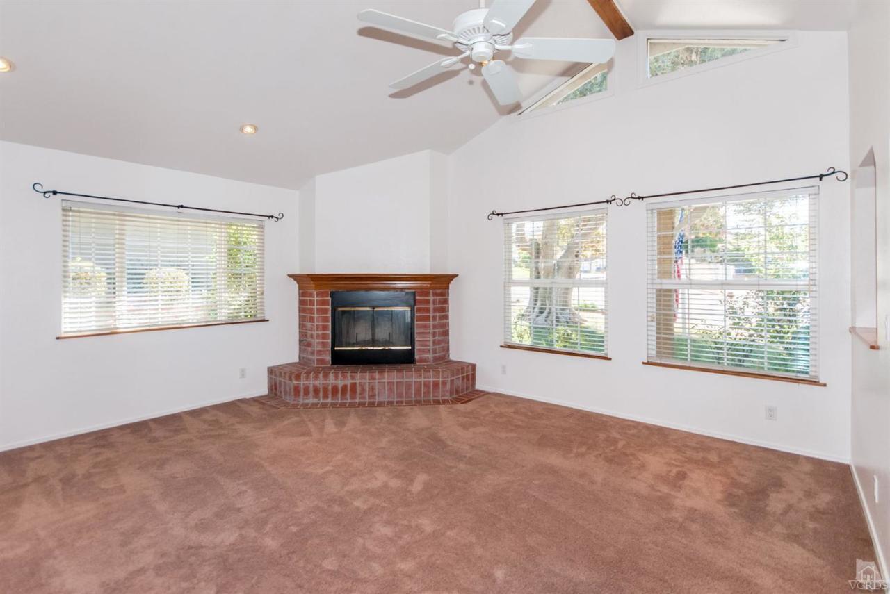 2753 Fitzgerald Road Simi Valley, CA 93065 - Photo 3 of 12 a view of an empty room with a window and fireplace