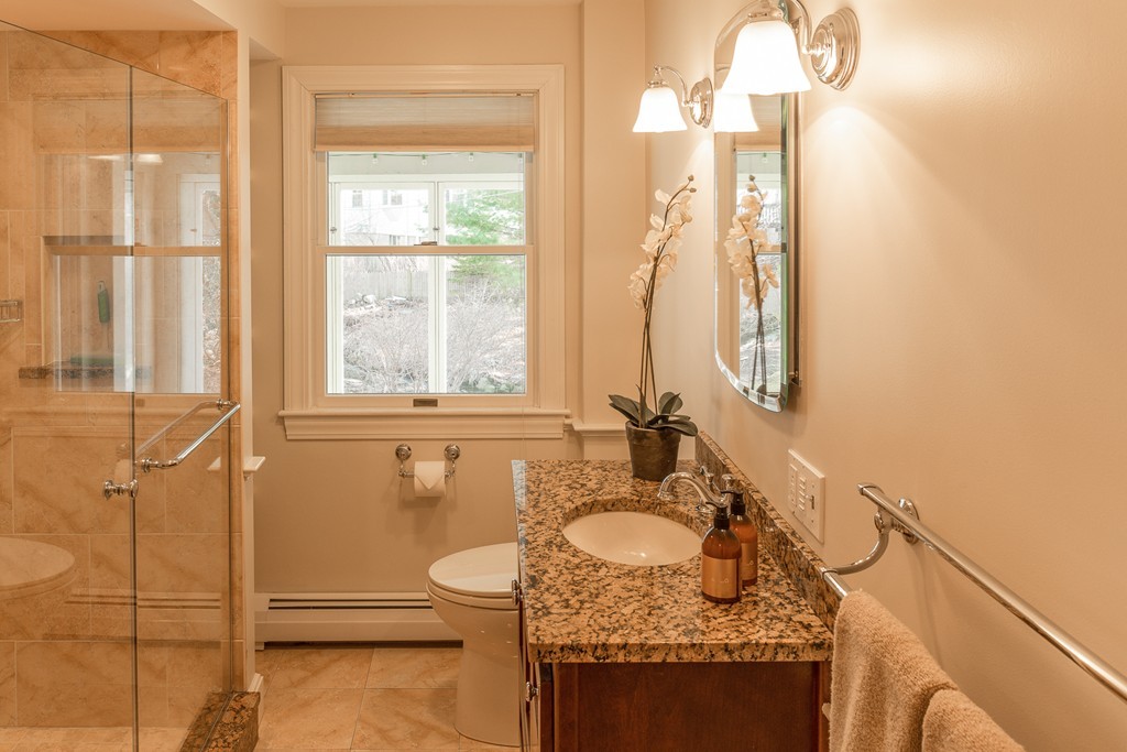 43 Shorewood Road Marblehead, MA 01945 - Photo 15 of 30 a bathroom with a granite countertop sink and a mirror