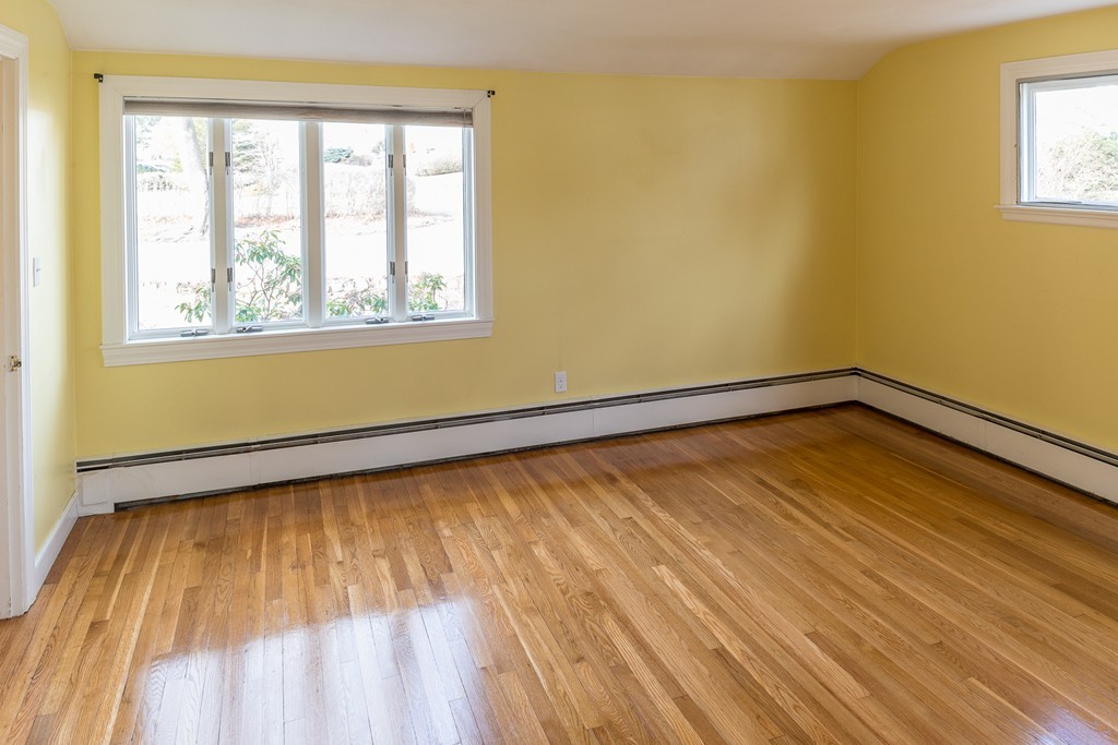 43 Shorewood Road Marblehead, MA 01945 - Photo 16 of 30 a view of an empty room with wooden floor and a window