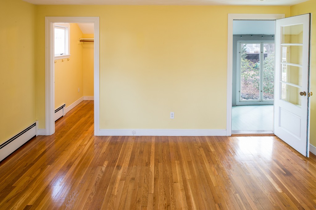 43 Shorewood Road Marblehead, MA 01945 - Photo 17 of 30 a view of an empty room with wooden floor and a window