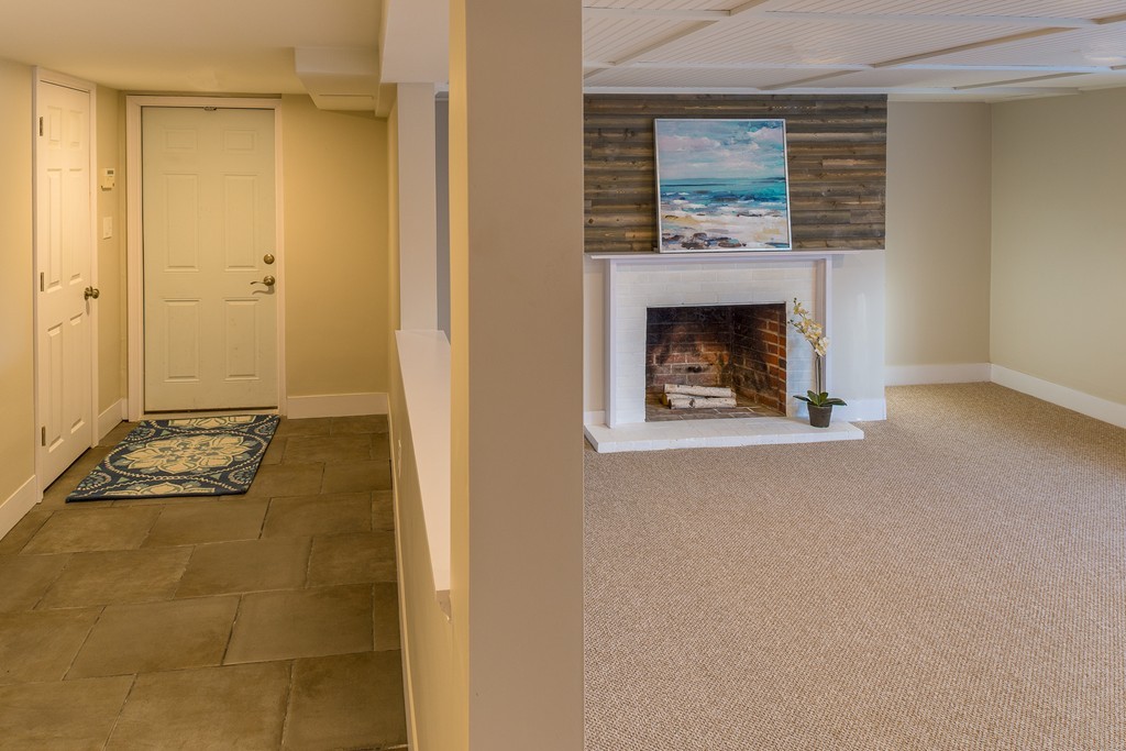 43 Shorewood Road Marblehead, MA 01945 - Photo 22 of 30 a view of a livingroom with a fireplace