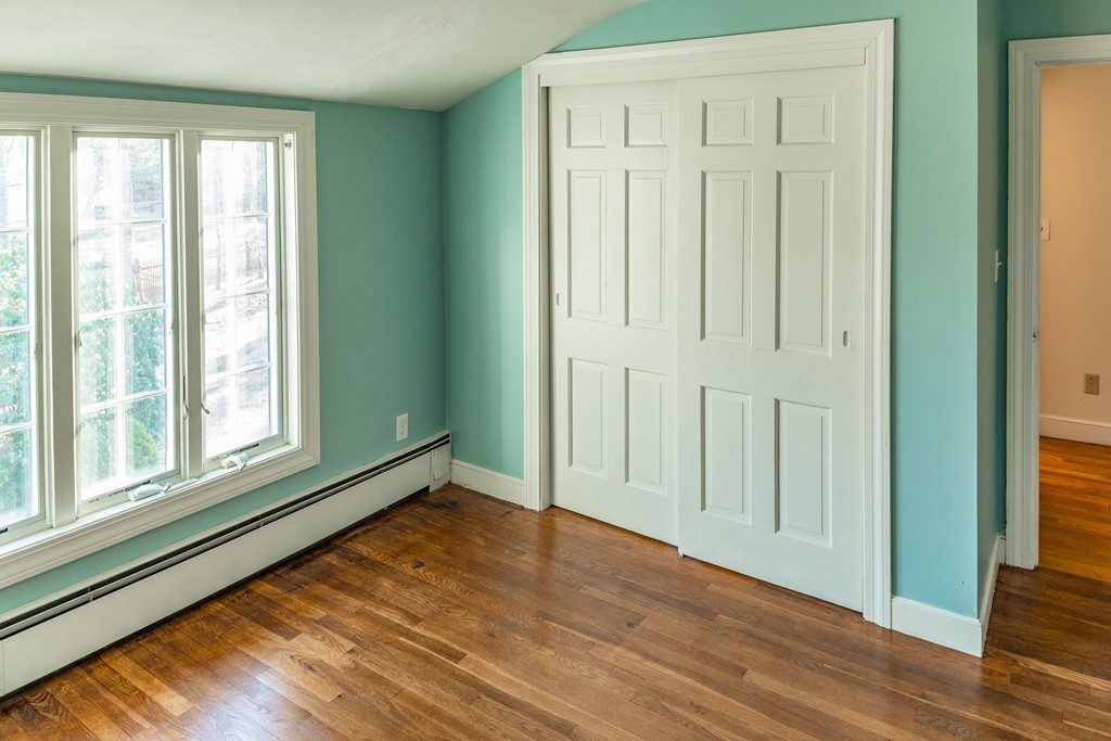 43 Shorewood Road Marblehead, MA 01945 - Photo 23 of 30 an empty room with wooden floor and windows