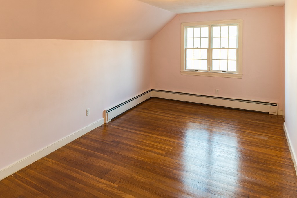 43 Shorewood Road Marblehead, MA 01945 - Photo 24 of 30 an empty room with wooden floor and windows