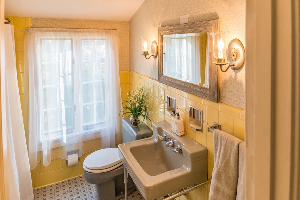 43 Shorewood Road Marblehead, MA 01945 - Photo 26 of 30 a bathroom with a sink toilet and shower