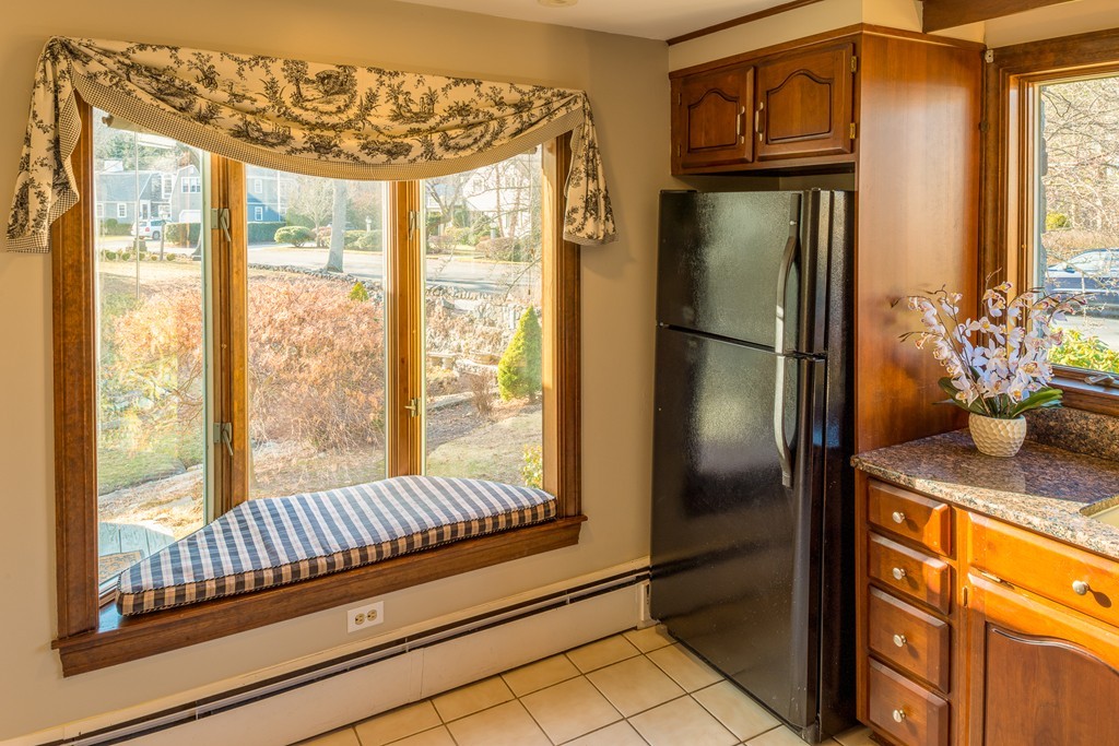 43 Shorewood Road Marblehead, MA 01945 - Photo 10 of 30 a kitchen with a refrigerator and large windows