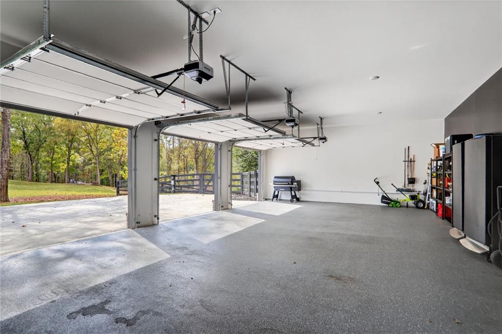1510 Batesville Road Canton, GA 30115 - Photo 19 of 68 a view of a livingroom with hardwood floor and a large window