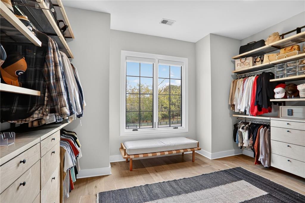1510 Batesville Road Canton, GA 30115 - Photo 24 of 68 a bedroom with furniture and a window