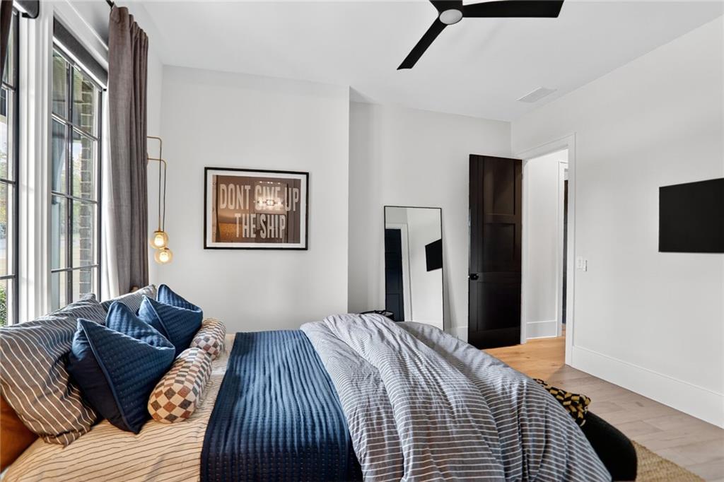 1510 Batesville Road Canton, GA 30115 - Photo 29 of 68 a bedroom with bed and a window