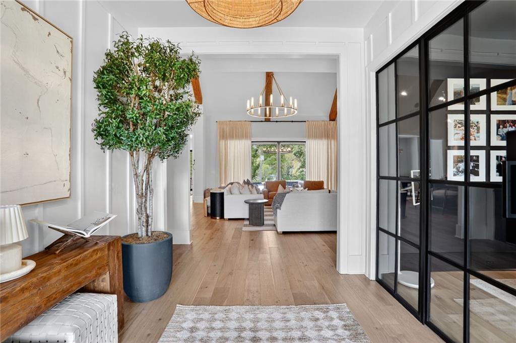 1510 Batesville Road Canton, GA 30115 - Photo 3 of 68 a living room with furniture and a potted plant