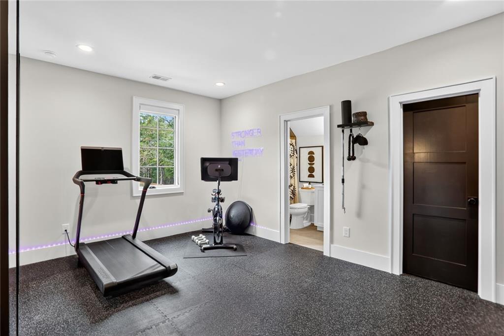 1510 Batesville Road Canton, GA 30115 - Photo 34 of 68 a view of a room with gym equipment