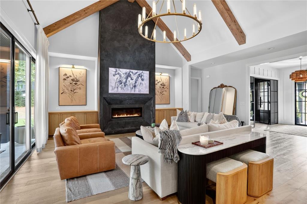 1510 Batesville Road Canton, GA 30115 - Photo 6 of 68 a living room with furniture a fireplace and flat screen tv