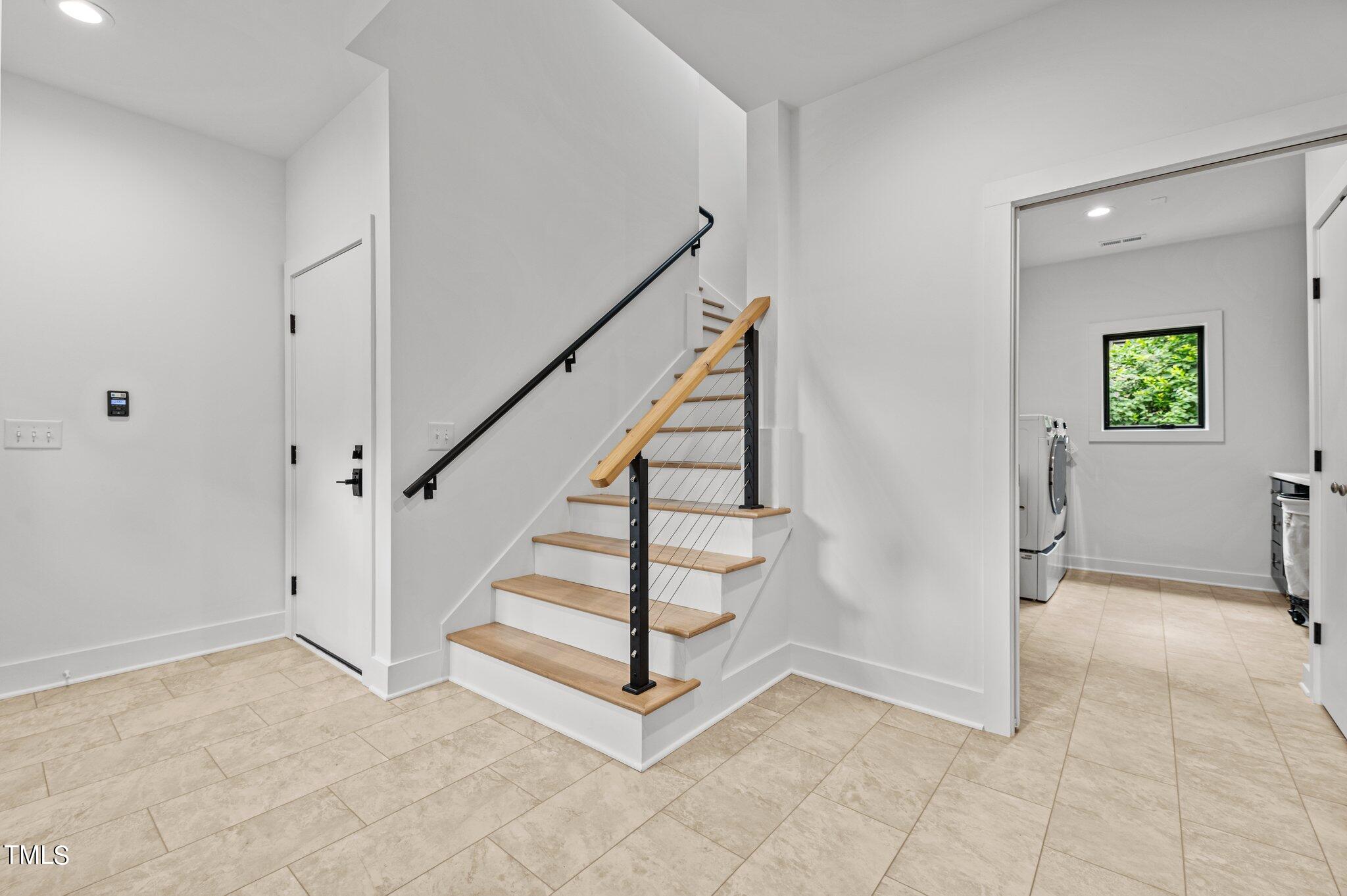 3611 Swann Street Raleigh, NC 27612 - Photo 41 of 72 Mudroom / Stairwell to Bonus Room