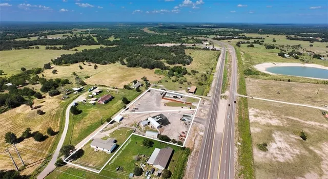 an aerial view of beach and city