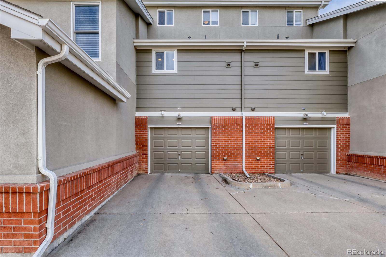 85 Uinta Way, Unit 702 Denver, CO 80230 - Photo 27 of 28 a view of a house with a garage