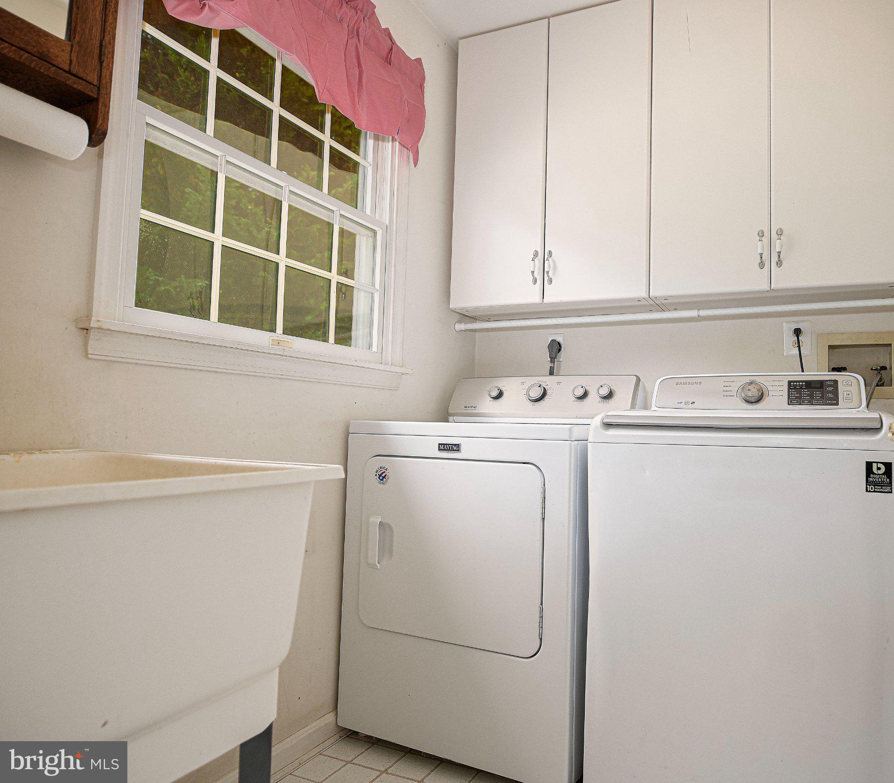 711 Gilbert Road Aberdeen, MD 21001 - Photo 10 of 54 a utility room with dryer and washer