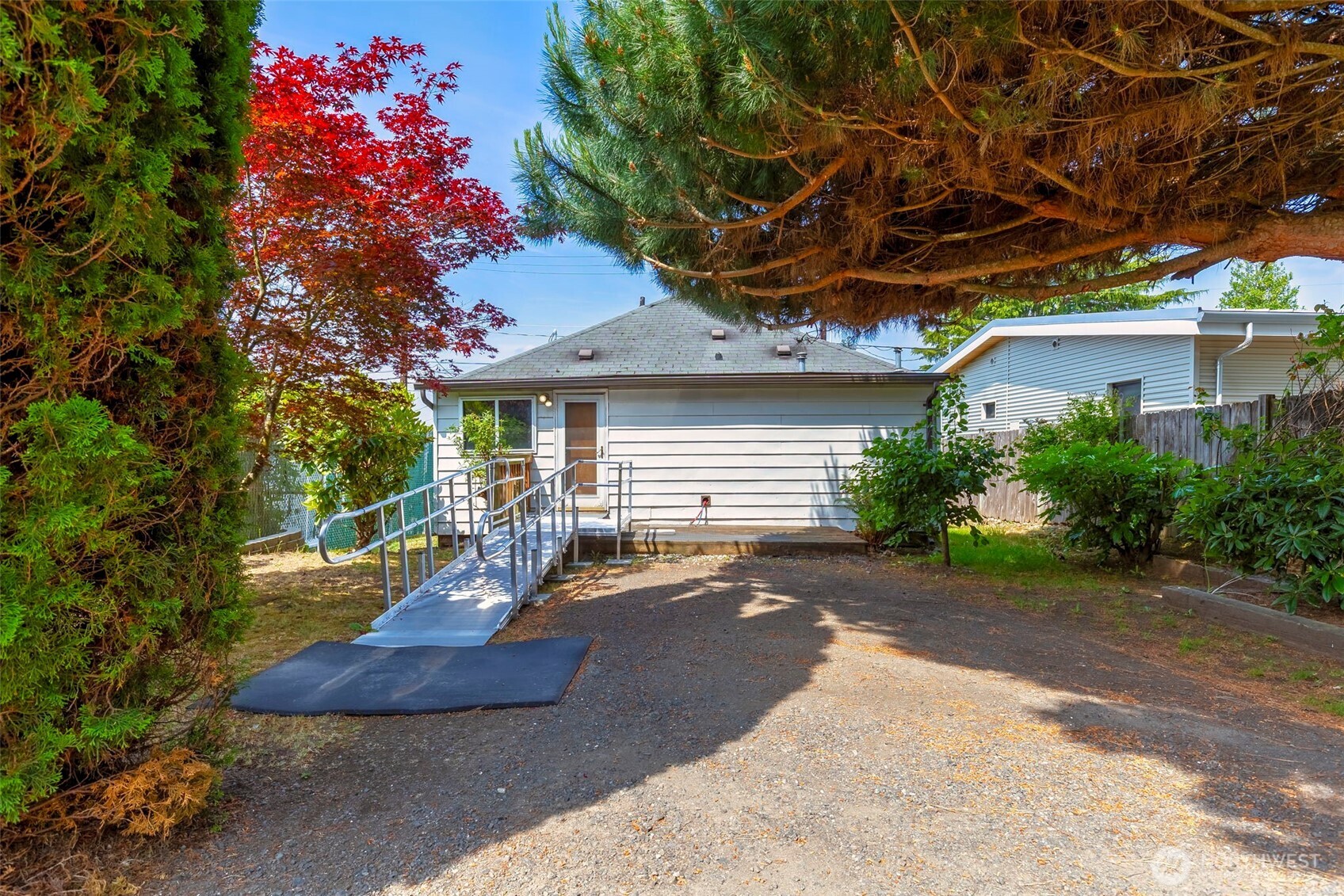 1112 Perry Avenue Bremerton, WA 98310 - Photo 13 of 21 a front view of a house with garden