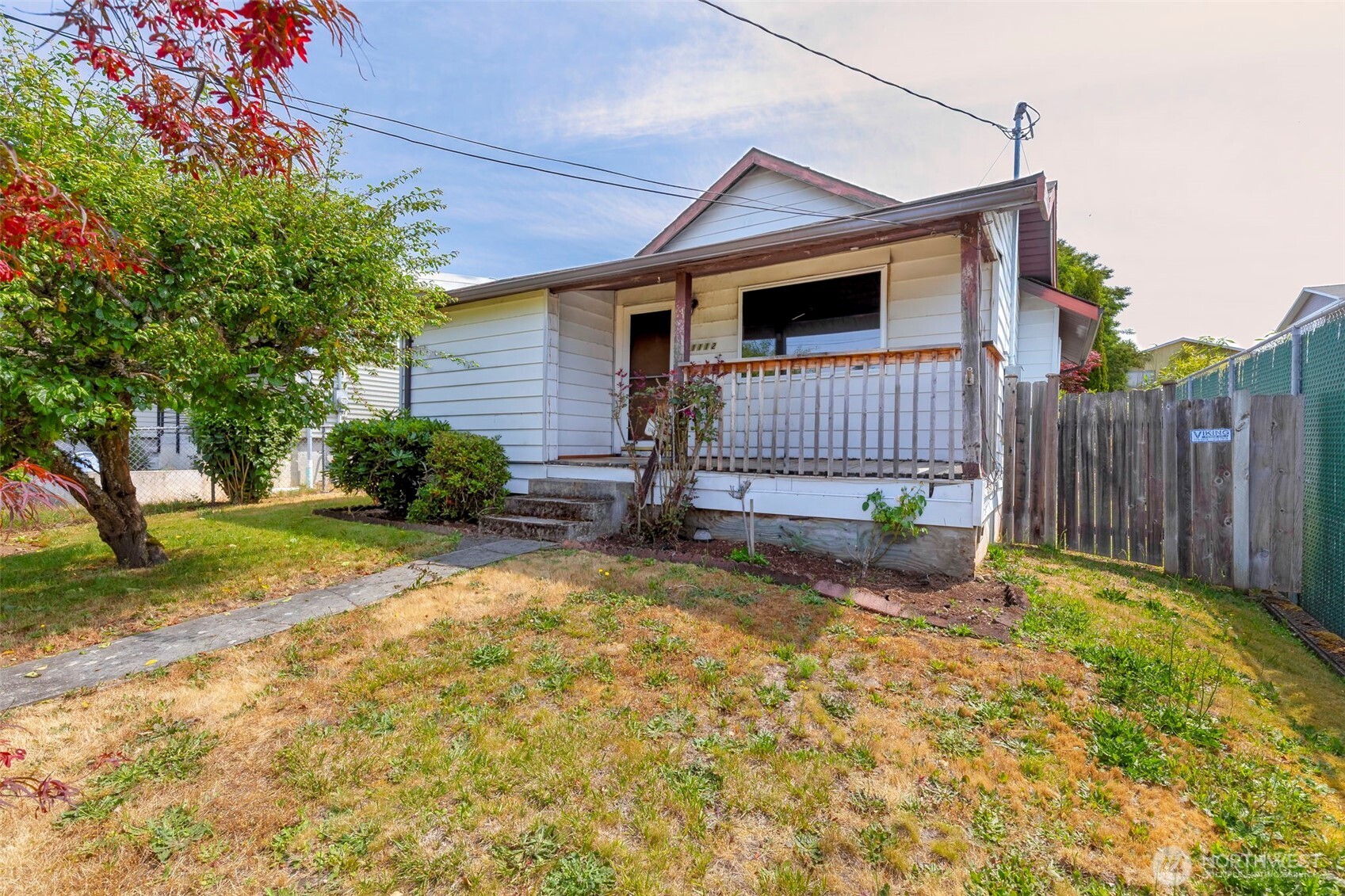 1112 Perry Avenue Bremerton, WA 98310 - Photo 7 of 21 a view of backyard with small cabin