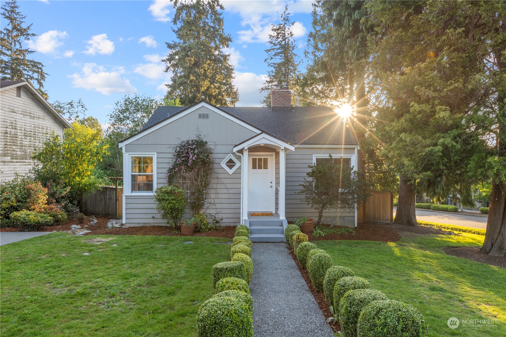 14357 36th Avenue Northeast Seattle, WA 98125 - Photo 1 of 23 a front view of a house with garden